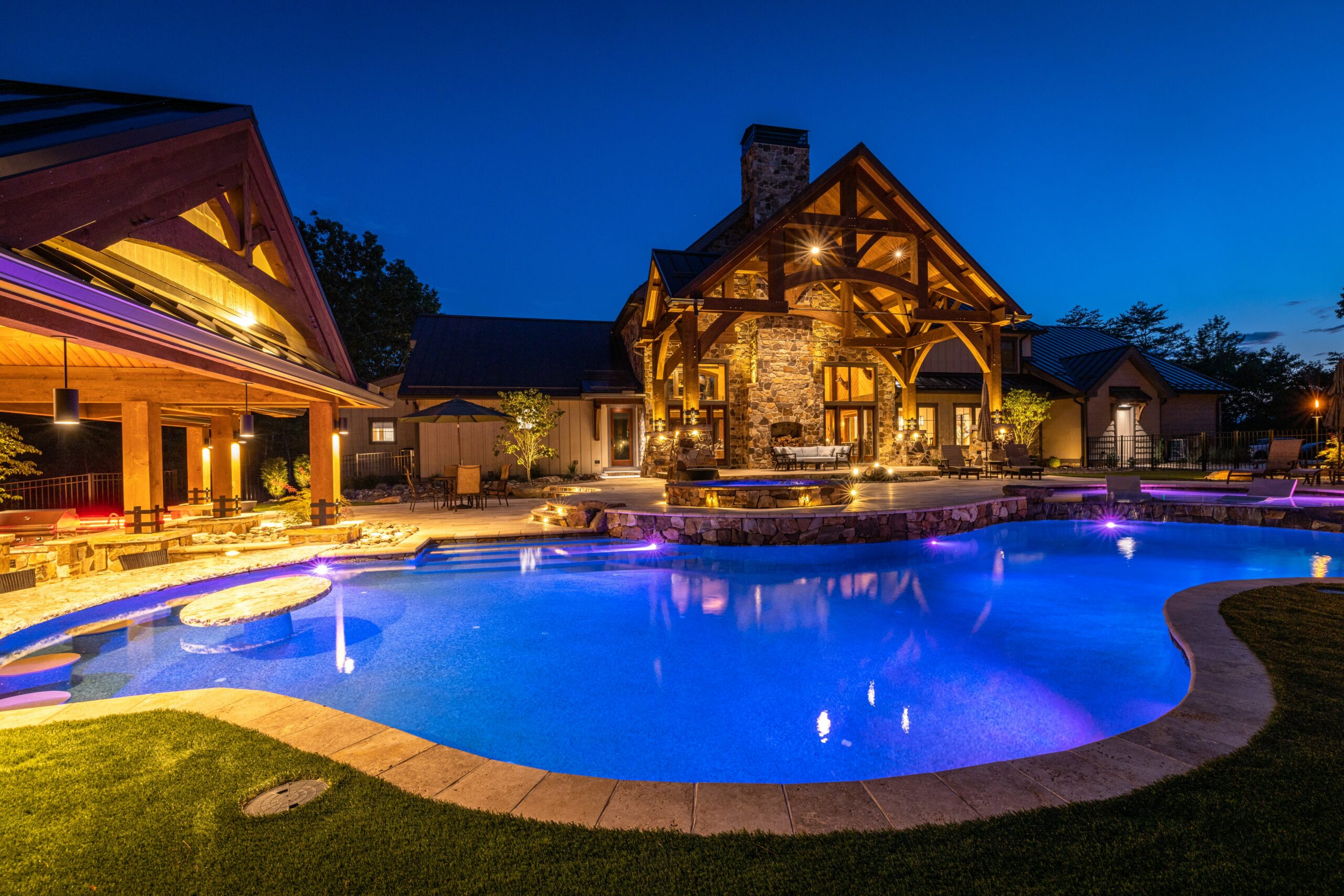 Outdoor lighting around a swimming pool or hardscape