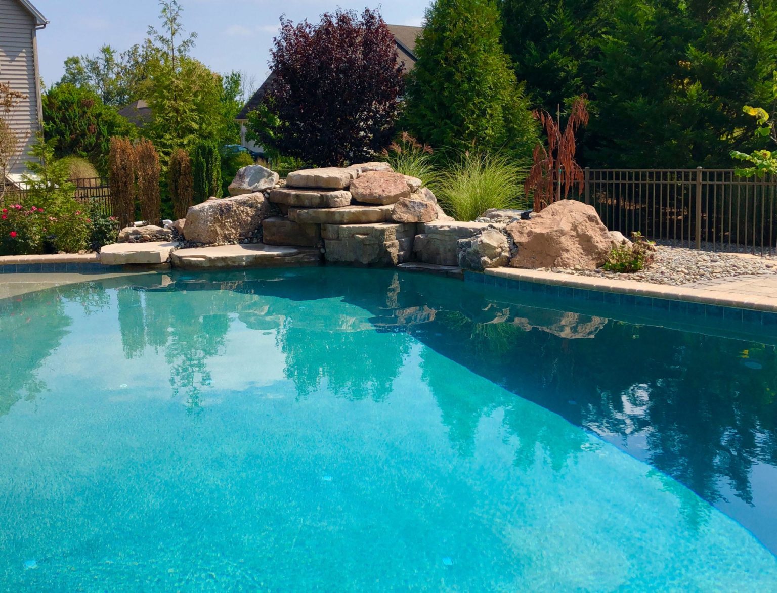 Concrete pool with waterfall in Dauphin County